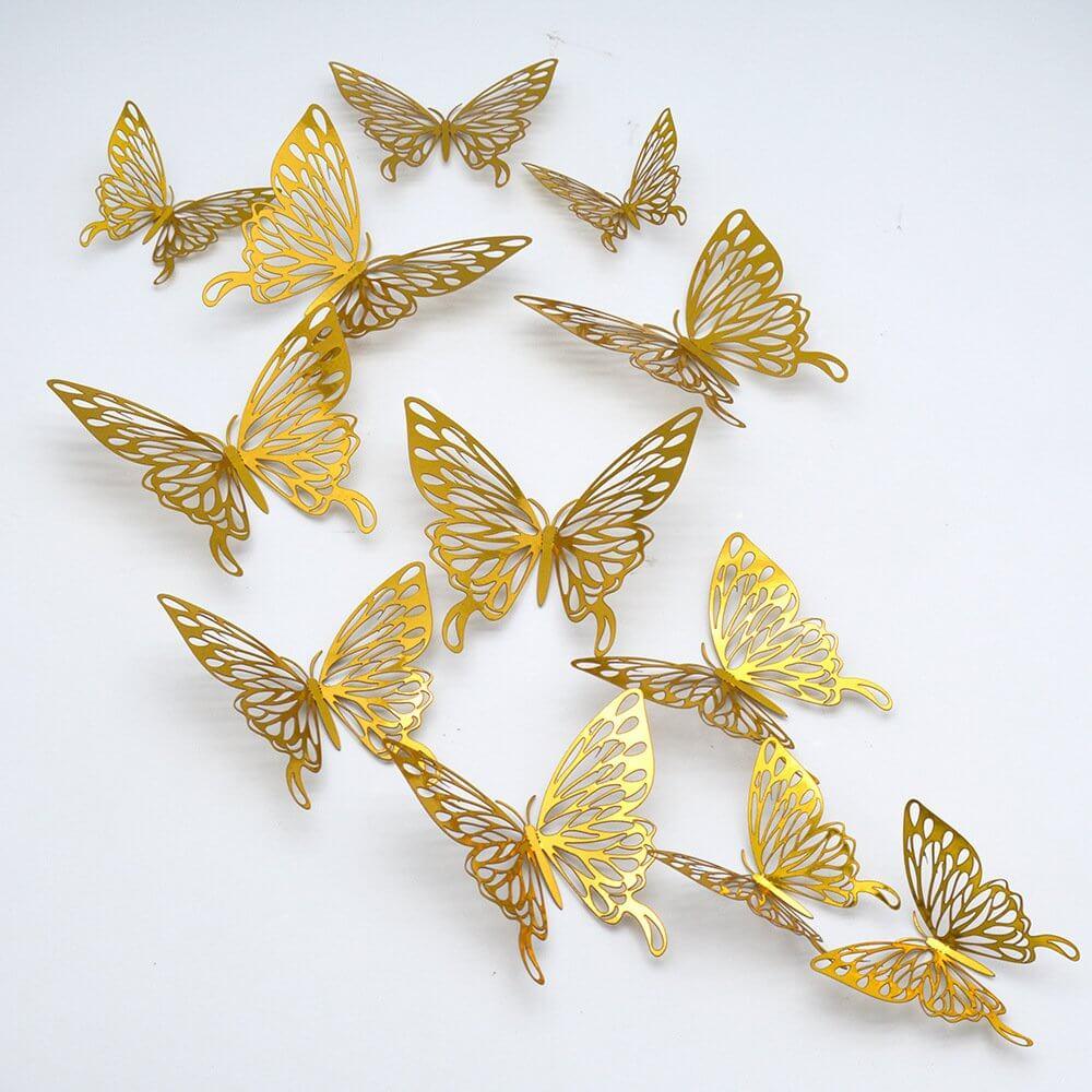 Decorative golden 3D butterfly wall stickers arranged on a white background for kids' celebrations